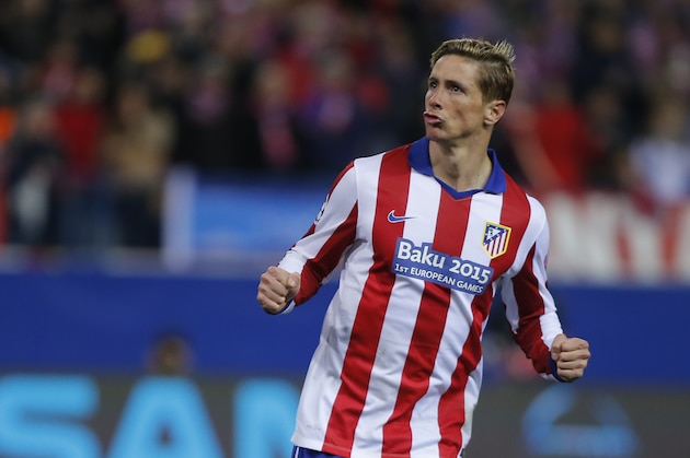 Atletico's Fernando Torres reacts after scoring a penalty during the Champions League round of sixteen second leg soccer match between Atletico de Madrid and Bayer 04 Leverkusen at the Vicente Calderon stadium in Madrid, Spain, Tuesday, March 17, 2015. Atletico won the match on penalties after extra time and advance to the quarter finals. (AP Photo/Andres Kudacki)