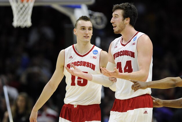 Mar 28, 2015; Los Angeles, CA, USA; Wisconsin Badgers forward Sam Dekker (15) speaks with forward Frank Kaminsky (44) against Arizona Wildcats during the second half in the finals of the west regional of the 2015 NCAA Tournament at Staples Center. Mandatory Credit: Robert Hanashiro-USA TODAY Sports