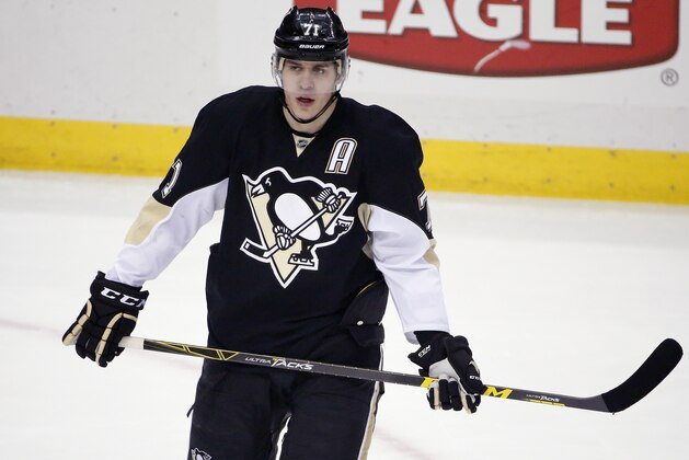 Pittsburgh Penguins' Evgeni Malkin (71) skates during the first period of an NHL hockey game against the Arizona Coyotes in Pittsburgh Saturday, March 28, 2015. The Penguins won 3-2. (AP Photo/Gene J. Puskar)