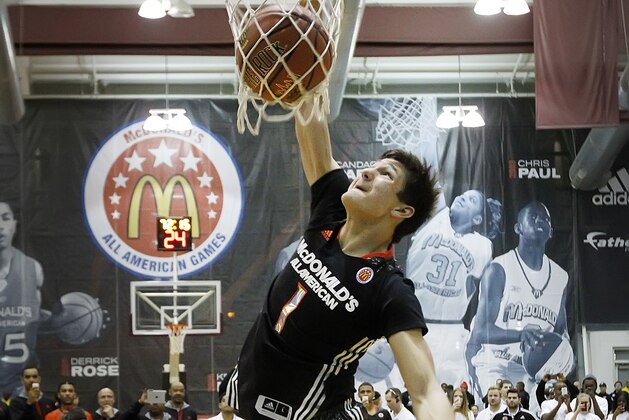 McDonald's West All-American Grayson Allen, of Jacksonville, Fla., competes in the slam dunk contest during the McDonald's All-American Jam Fest at the University of Chicago in Chicago, on Monday, March 31, 2014. Allen won first place in the slam dunk contest. (AP Photo/Andrew A. Nelles)