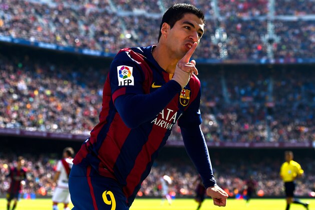 BARCELONA, SPAIN - MARCH 08:  Luis Suarez of FC Barcelona celebrates after scoring the opening goal during the La Liga match between FC Barcelona and Rayo Vallecano de Madrid at Camp Nou on March 8, 2015 in Barcelona, Spain.  (Photo by David Ramos/Getty Images)