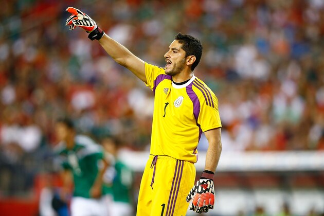 FOXBORO, MA - JUNE 06: Jesus Corona #1 of Mexico yells instructions to his team in the first half against Portugal during the international friendly match at Gillette Stadium on June 6, 2014 in Foxboro, Massachusetts.  (Photo by Jared Wickerham/Getty Images)