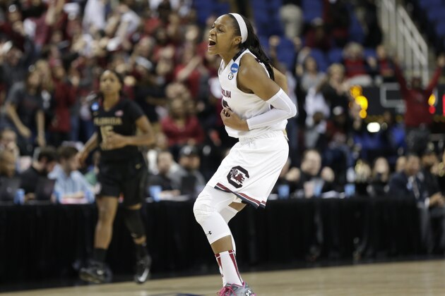 South Carolina's Tiffany Mitchell reacts during the second half of a women's college basketball regional final game against Florida State in the NCAA Tournament in Greensboro, N.C., Sunday, March 29, 2015. South Carolina won 80-74. (AP Photo/Gerry Broome)