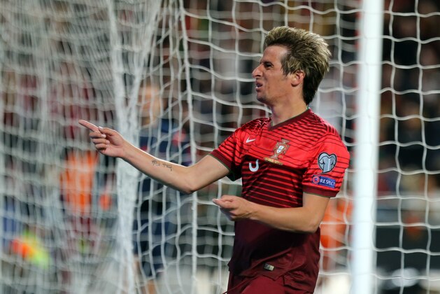 Portugal's Fabio Coentrao celebrates after scoring his side's second goal against Serbia during the Euro 2016 group I qualifying soccer match between Portugal and Serbia at the Luz stadium, in Lisbon, Portugal, Sunday, March 29, 2015. (AP Photo/Francisco Seco)