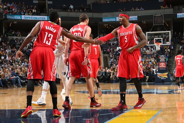 MEMPHIS, TN - DECEMBER 26:  Josh Smith #5 of the Houston Rockets is greeted by teammate Corey Brewer #13 during the game against the Memphis Grizzlies on December 26, 2014 at the FedExForum in Memphis, Tennessee.  NOTE TO USER: User expressly acknowledges and agrees that, by downloading and or using this Photograph, user is consenting to the terms and conditions of the Getty Images License Agreement. Mandatory Copyright Notice: Copyright 2014 NBAE (Photo by Joe Murphy/NBAE via Getty Images)