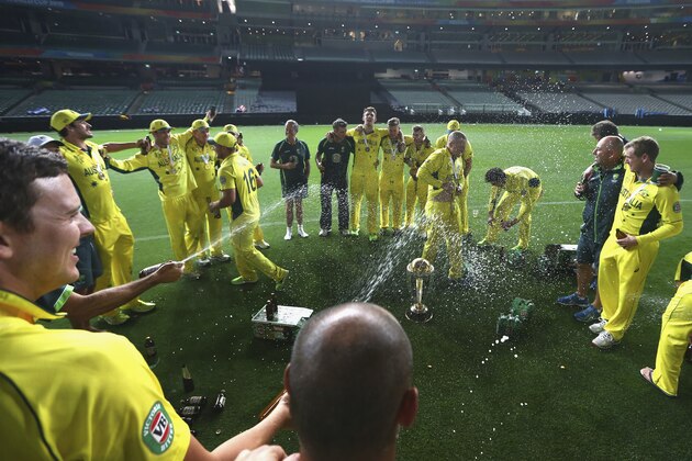 MELBOURNE, AUSTRALIA - MARCH 29:  The Australian Team celebrate on the ground at 2.15am after the 2015 ICC Cricket World Cup final match between Australia and New Zealand at Melbourne Cricket Ground on March 29, 2015 in Melbourne, Australia.  (Photo by Ryan Pierse/Getty Images)