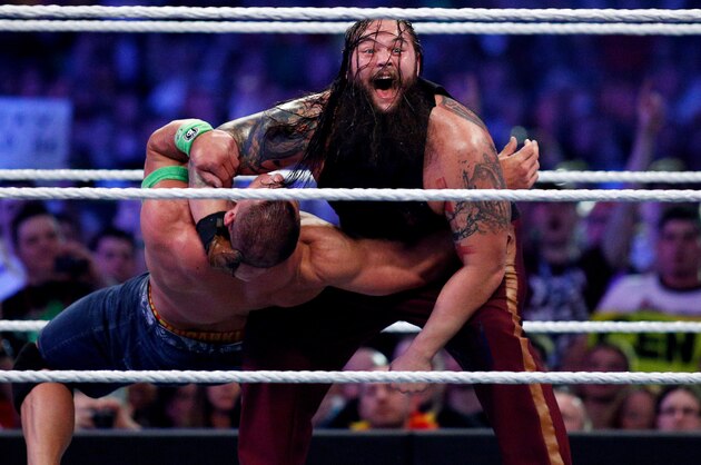 John Cena, left, and Bray Wyatt, right, compete during Wrestlemania XXX at the Mercedes-Benz Super Dome in New Orleans on Sunday, April 6, 2014. (Jonathan Bachman/AP Images for WWE)