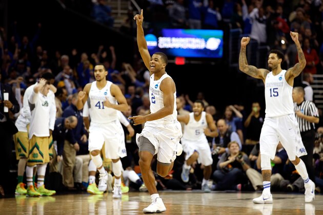 CLEVELAND, OH - MARCH 28:  Aaron Harrison #2 of the Kentucky Wildcats celebrates after defeating the Notre Dame Fighting Irish during the Midwest Regional Final of the 2015 NCAA Men's Basketball tournament at Quicken Loans Arena on March 28, 2015 in Cleveland, Ohio.  (Photo by Gregory Shamus/Getty Images)
