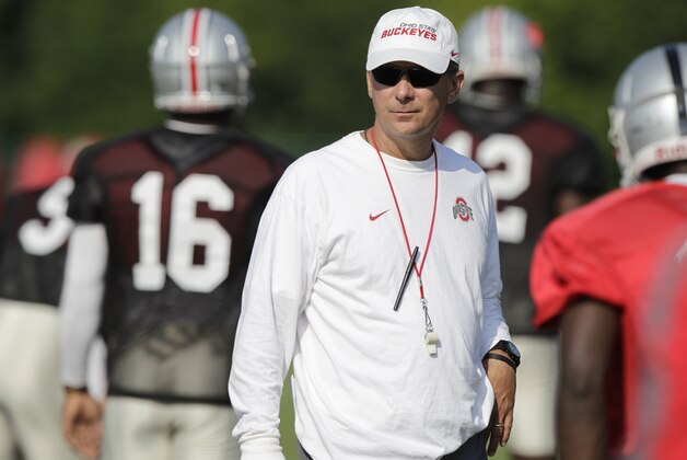 Ohio State head coach Urban Meyer watches drills during an NCAA college football practice on Saturday, Aug. 9, 2014, in Columbus, Ohio. (AP Photo/Jay LaPrete)