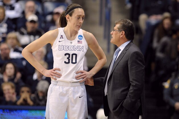 Connecticut’s Breanna Stewart, left, talks with Connecticut head coach Geno Auriemma during the first half of a women's college basketball game against Rutgers in the second round of the NCAA tournament, Monday, March 23, 2015, in Storrs, Conn. (AP Photo/Jessica Hill)