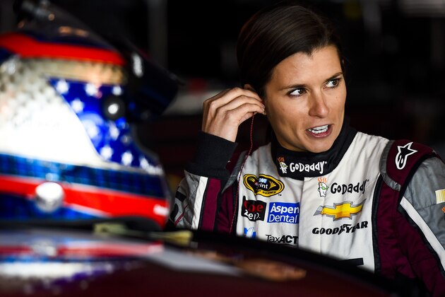 MARTINSVILLE, VA - MARCH 28:  Danica Patrick, driver of the #10 TaxAct Chevrolet, adjusts her equipment in the garage area during practice for the NASCAR Sprint Cup Series STP 500 at Martinsville Speedway on March 28, 2015 in Martinsville, Virginia.  (Photo by Alex Goodlett/Getty Images)