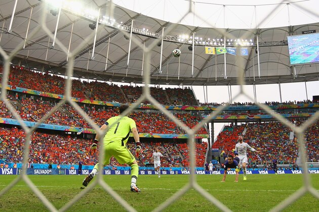 SALVADOR, BRAZIL - JUNE 13:  Iker Casillas of Spain watches as a header from Robin van Persie of the Netherlands goes over his head for a goal in the first half during the 2014 FIFA World Cup Brazil Group B match between Spain and Netherlands at Arena Fonte Nova on June 13, 2014 in Salvador, Brazil.  (Photo by Ian Walton/Getty Images)