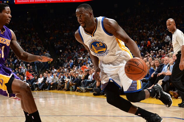 OAKLAND, CA - MARCH 16:  Draymond Green #23 of the Golden State Warriors handles the ball against the Los Angeles Lakers on March 16, 2015 at Oracle Arena in Oakland, California. NOTE TO USER: User expressly acknowledges and agrees that, by downloading and or using this photograph, user is consenting to the terms and conditions of Getty Images License Agreement. Mandatory Copyright Notice: Copyright 2015 NBAE (Photo by Noah Graham/NBAE via Getty Images)