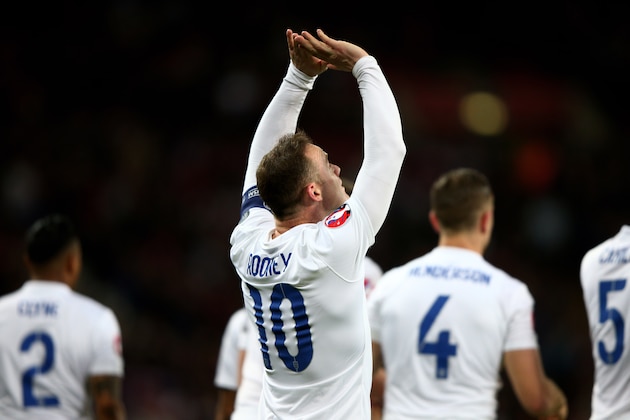 LONDON, ENGLAND - MARCH 27:  Wayne Rooney of England celebrates the first goal during the EURO 2016 Qualifier match between England and Lithuania at Wembley Stadium on March 27, 2015 in London, England.  (Photo by Ian Walton/Getty Images)