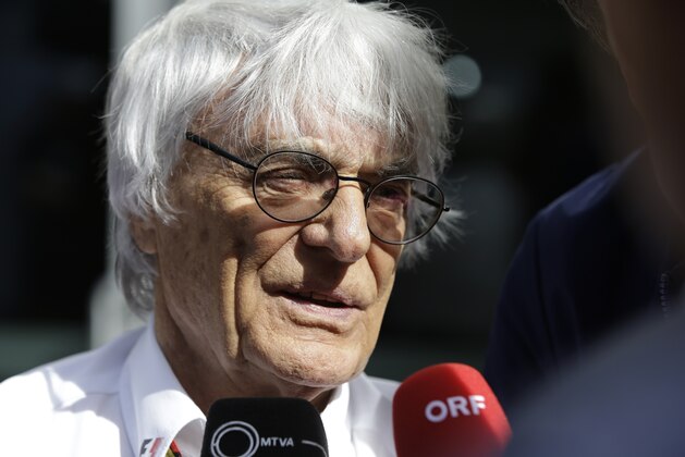 Bernie Ecclestone speaks to the media before the start of the Formula One U.S. Grand Prix auto race at the Circuit of the Americas, Sunday, Nov. 2, 2014, in Austin, Texas. (AP Photo/Darron Cummings)