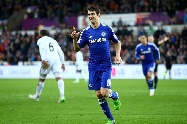 SWANSEA, WALES - JANUARY 17:  Oscar of Chelsea celebrates after scoring his team's fourth goal during the Barclays Premier League match between Swansea City and Chelsea at Liberty Stadium on January 17, 2015 in Swansea, Wales.  (Photo by Richard Heathcote/Getty Images)