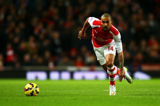 LONDON, ENGLAND - FEBRUARY 10:  Theo Walcott of Arsenal in action during the Barclays Premier League match between Arsenal and Leicester City at Emirates Stadium on February 10, 2015 in London, England.  (Photo by Richard Heathcote/Getty Images)