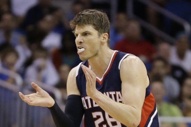Atlanta Hawks' Kyle Korver claps his hands after sinking a 3-point shot against the Orlando Magic during the second half of an NBA basketball game, Wednesday, March 25, 2015, in Orlando, Fla. Atlanta won 95-83. (AP Photo/John Raoux)