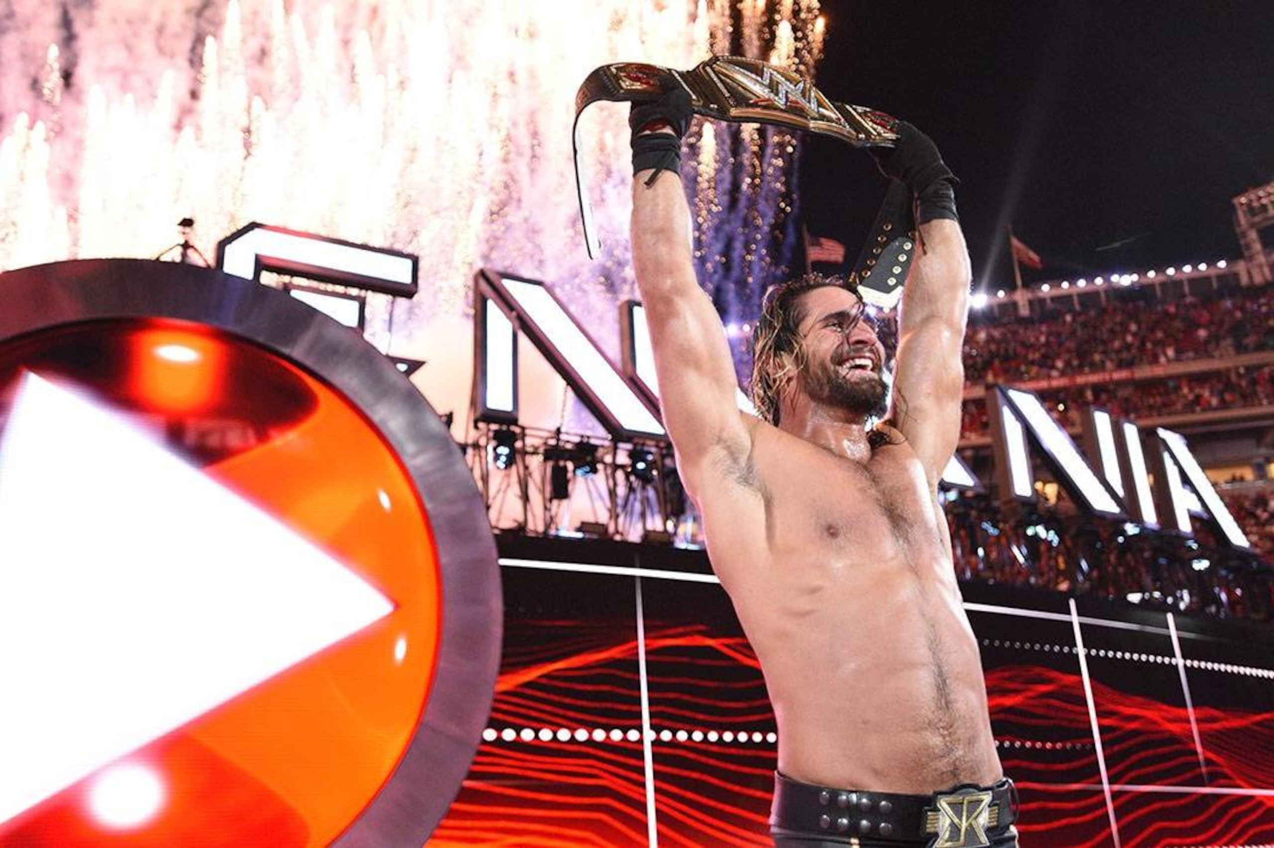 WWE Superstar Seth Rollins celebrates becoming the new WWE World Heavyweight Champion at WrestleMania 31 at Levi's Stadium on Sunday, March 29, 2015 in Santa Clara, CA. WrestleMania broke the Levi’s Stadium attendance record at 76,976 fans from all 50 states and 40 countries. (Don Feria/AP Images for WWE)