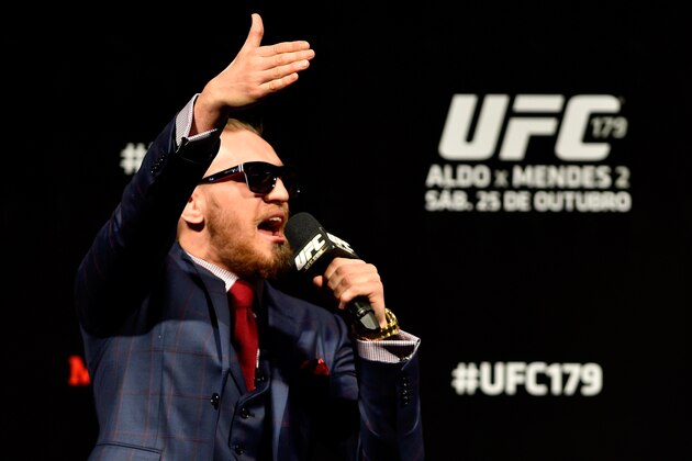 RIO DE JANEIRO, BRAZIL - OCTOBER 24:  Conor McGregor of Ireland interacts with fans during a Q&A session before the UFC 179 weigh-in  at Maracanazinho on October 24, 2014 in Rio de Janeiro, Brazil.  (Photo by Buda Mendes/Getty Images)