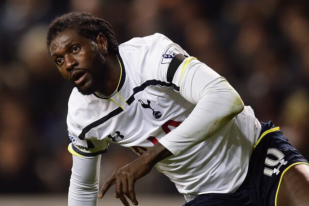 LONDON, ENGLAND - JANUARY 21:  Emmanuel Adebayour of Spurs pulls himself to his feet during the Capital One Cup Semi-Final first leg match between Tottenham Hotspur and Sheffield United at White Hart Lane on January 21, 2015 in London, England.  (Photo by Jamie McDonald/Getty Images)