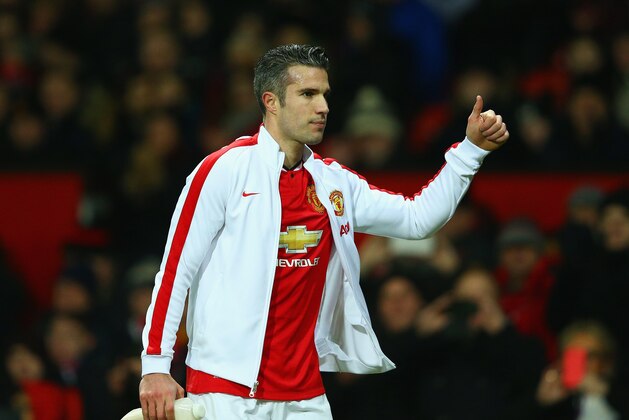 MANCHESTER, ENGLAND - FEBRUARY 03:  Robin van Persie of Manchester United acknowledges the fans during the FA Cup Fourth round replay match between Manchester United and Cambridge United at Old Trafford on February 3, 2015 in Manchester, England.  (Photo by Clive Mason/Getty Images)