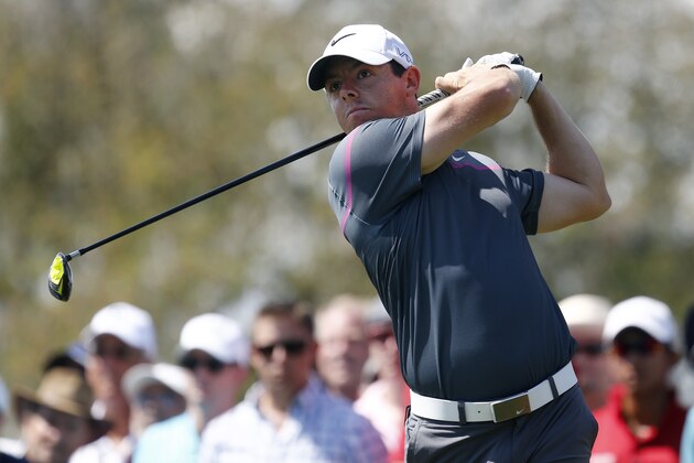 Rory McIlroy, of Northern Ireland, watches his tee shot on the eighth hole during the third round of the Arnold Palmer Invitational golf tournament in Orlando, Fla., Saturday, March 21, 2015. (AP Photo/Reinhold Matay)