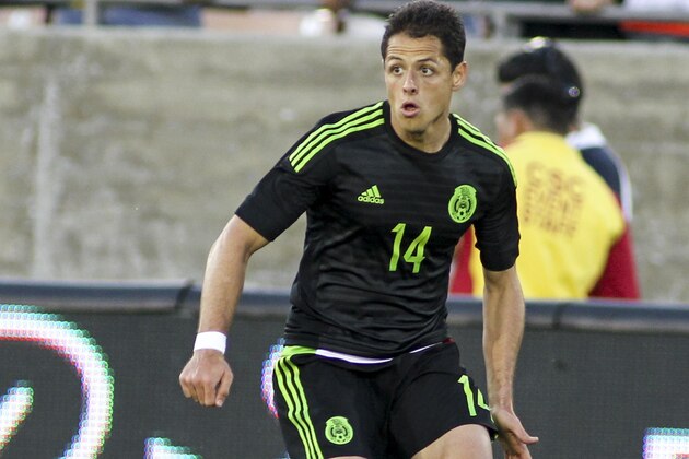 Mexico Javier Hernandez (14) in action during a soccer friendly match against Ecuador, March 28, 2015, at Los Angeles Memorial Coliseum in Los Angeles. (AP Photo/Ringo H.W. Chiu)