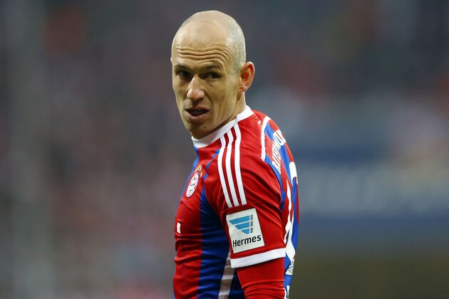 Bayern's Arjen Robben from the Netherlands watches the ball during the German first division Bundesliga soccer match between FC Bayern Munich and Borussia Moenchengladbach in the Allianz Arena in Munich, Germany, on Sunday, March 22, 2015. (AP Photo/Matthias Schrader)