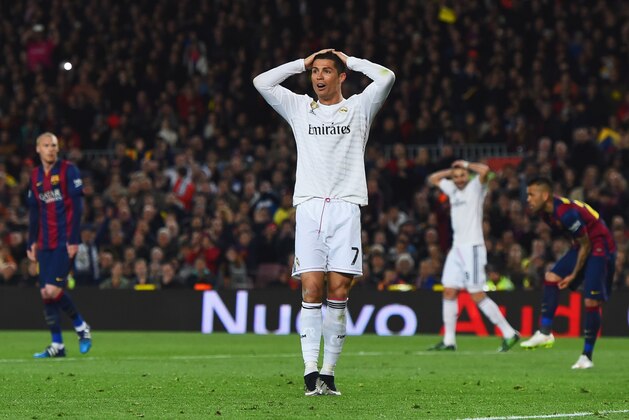 BARCELONA, SPAIN - MARCH 22:  Cristiano Ronaldo of Real Madrid CF (7) reacts during the La Liga match between FC Barcelona and Real Madrid CF at Camp Nou on March 22, 2015 in Barcelona, Spain.  (Photo by David Ramos/Getty Images)
