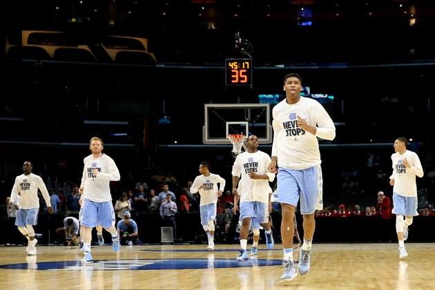 LOS ANGELES, CA - MARCH 26:  Kennedy Meeks #3 of the North Carolina Tar Heels stretches before taking on the Wisconsin Badgers in the West Regional Semifinal of the 2015 NCAA Men's Basketball Tournament at Staples Center on March 26, 2015 in Los Angeles, California.  (Photo by Stephen Dunn/Getty Images)