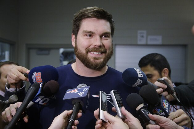 New England Patriots center Dan Connolly talks to reporters during a media availability in the locker room at the NFL football team's facility Wednesday, Nov. 19, 2014, in Foxborough, Mass. The Patriots will play the Detroit Lions on Sunday in Foxborough.(AP Photo/Stephan Savoia)