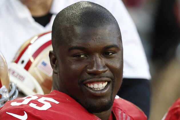 San Francisco 49ers defensive end Tank Carradine (95) sits on the bench during the second half of an NFL football game against the Washington Redskins in Santa Clara, Calif., Sunday, Nov. 23, 2014. (AP Photo/Tony Avelar)