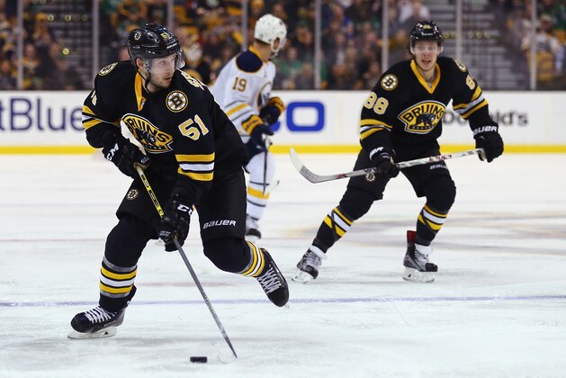 BOSTON, MA - MARCH 17:  Ryan Spooner #51 of the Boston Bruins skates against the Buffalo Sabres during the third period at TD Garden on March 17, 2015 in Boston, Massachusetts.  (Photo by Maddie Meyer/Getty Images)
