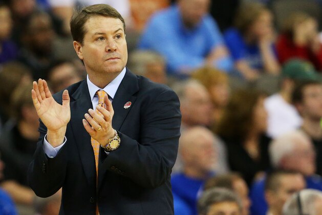OMAHA, NE - MARCH 20:  Head coach Travis Ford of the Oklahoma State Cowboys looks on in the first half against the Oregon Ducks during the second round of the 2015 NCAA Men's Basketball Tournament at the CenturyLink Center on March 20, 2015 in Omaha, Nebraska.  (Photo by Ronald Martinez/Getty Images)