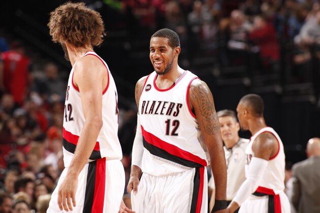 PORTLAND, OR - MARCH 30: LaMarcus Aldridge #12 of the Portland Trail Blazers during the game against the Phoenix Suns on March 30, 2015 at Moda Center in Portland, Oregon. NOTE TO USER: User expressly acknowledges and agrees that, by downloading and/or using this photograph, User is consenting to the terms and conditions of the Getty Images License Agreement. Mandatory Copyright Notice: Copyright 2015 NBAE (Photo by Cameron Browne/NBAE via Getty Images)