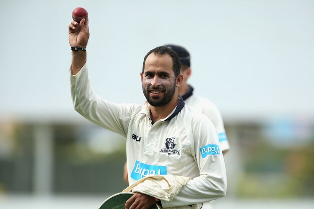 HOBART, AUSTRALIA - MARCH 22:  Fawad Ahmed of Victoria walks off holding the ball up high after taking eight wickets during day two of the Sheffield Shield final match between Victoria and Western Australia at Blundstone Arena on March 22, 2015 in Hobart, Australia.  (Photo by Robert Prezioso/Getty Images)