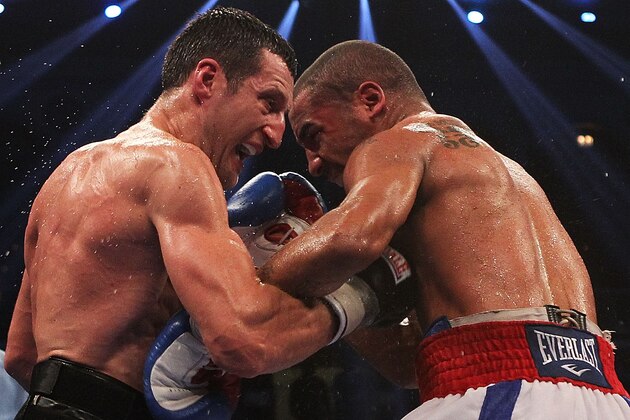 ATLANTIC CITY, NJ - DECEMBER 17:  Carl Froch of England lands a right on Andre Ward during their WBA/WBC Super Middleweight Championship bout at Boardwalk Hall on December 17, 2011 in Atlantic City, New Jersey.  (Photo by Nick Laham/Getty Images)