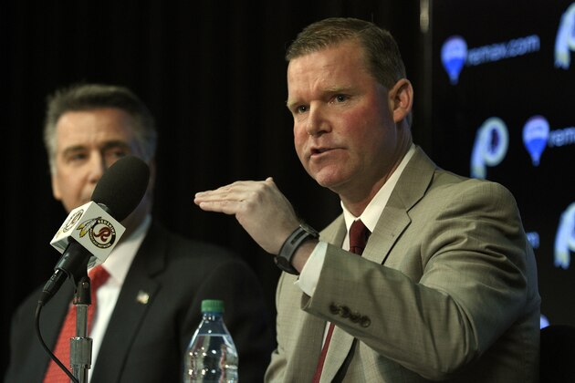 Scot McCloughan, right, speaks during an NFL football press conference where he was introduced as the Washington Redskins new general manager, Friday, Jan. 9, 2015, in Ashburn, Va. At left is Washington Redskins president Bruce Allen. (AP Photo/Nick Wass)