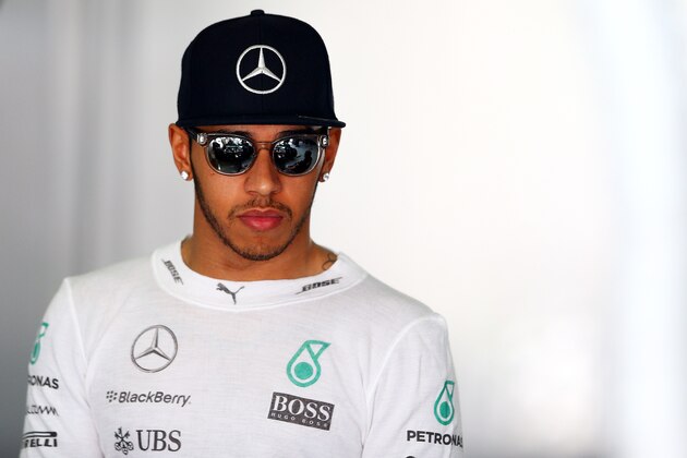 KUALA LUMPUR, MALAYSIA - MARCH 28:  Lewis Hamilton of Great Britain and Mercedes GP looks on in the garage during final practice for the Malaysia Formula One Grand Prix at Sepang Circuit on March 28, 2015 in Kuala Lumpur, Malaysia.  (Photo by Clive Mason/Getty Images)