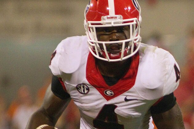 Aug 31, 2013; Clemson, SC, USA; Georgia Bulldogs running back Keith Marshall (4) carries the ball during the fourth quarter against the Clemson Tigers at Clemson Memorial Stadium. Tigers won 38-35. Mandatory Credit: Joshua S. Kelly-USA TODAY Sports