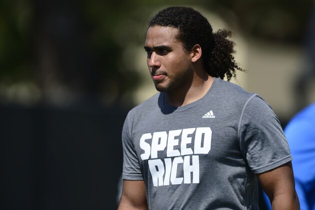 Linebacker Eric Kendricks walks to an interview during UCLA's pro day, where players worked out for NFL football scouts, at Spaulding Field in Los Angeles on Tuesday, March 10, 2015. (AP Photo/Kelvin Kuo)