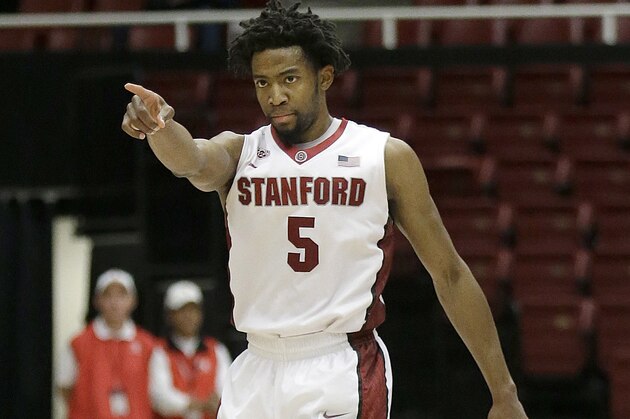 In this Tuesday, March 24, 2015, photo, Stanford's Chasson Randle reacts after scoring against Vanderbilt during the second half of an NCAA college basketball game in the NIT in Stanford, Calif. Randle is on the brink of becoming the Cardinal's career scoring leader. With 2,326 points, he became the Pac-12 Conference's fourth-leading scorer in Tuesday's NIT quarterfinal win against Vanderbilt. (AP Photo/Jeff Chiu)