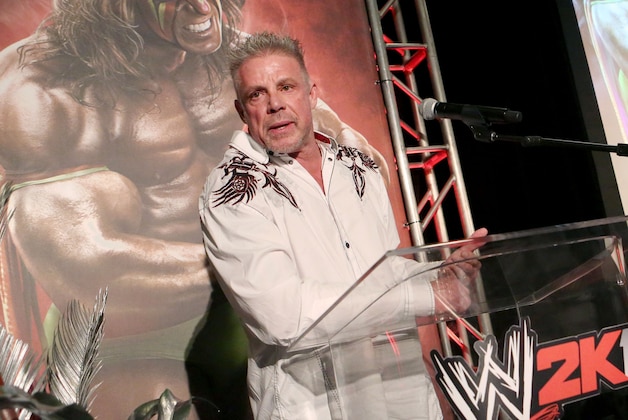 IMAGE DISTRIBUTED FOR 2K - Warrior talks about his career as the Ultimate Warrior, a playable WWE Legend, available exclusively by pre-ordering WWE 2K14, on Sunday, Aug. 18, 2013 in Los Angeles.  (Photo by Casey Rodgers/Invision for 2K/AP Images)