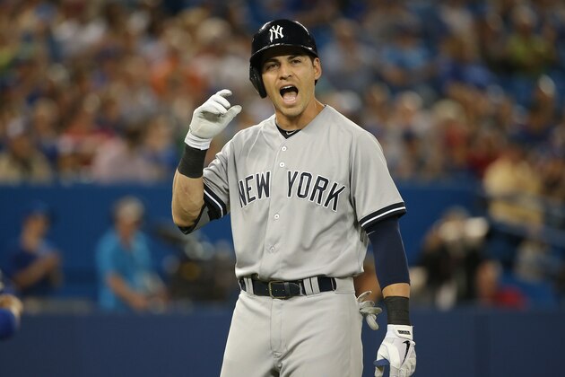 TORONTO, CANADA - JUNE 25: Jacoby Ellsbury #22 of the New York Yankees reacts after lining out with a runner on third base in the first inning during MLB game action against the Toronto Blue Jays on June 25, 2014 at Rogers Centre in Toronto, Ontario, Canada. (Photo by Tom Szczerbowski/Getty Images)