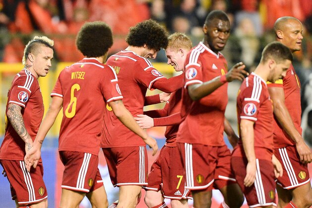 Belgium's Marouane Fellaini , center left, celebrates with teammates after scoring during the Euro 2016 Group B qualifying soccer match between Belgium and Cyprus, at the King Baudouin stadium, in Brussels on Saturday, March 28, 2015. (AP Photo/Laurent Dubrule)