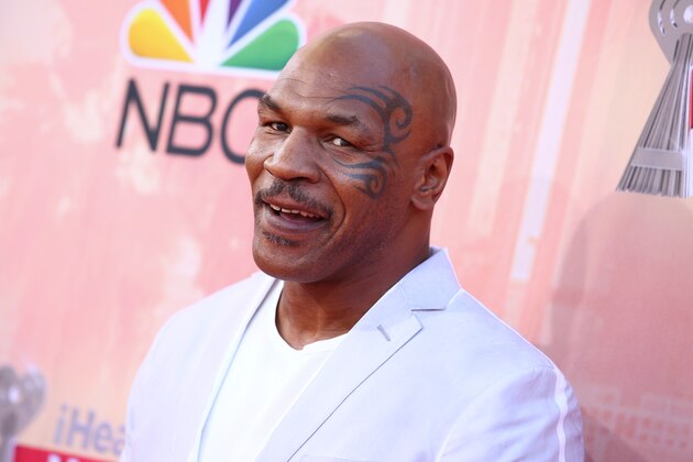 Mike Tyson arrives at the iHeartRadio Music Awards at The Shrine Auditorium on Sunday, March 29, 2015, in Los Angeles. (Photo by John Salangsang/Invision/AP)