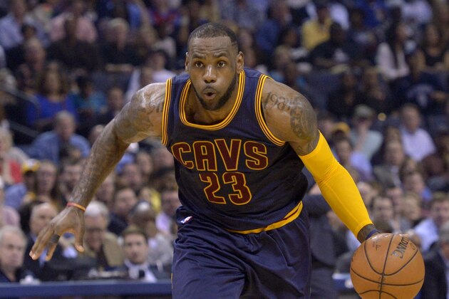 Cleveland Cavaliers forward LeBron James (23) plays in the first half of an NBA basketball game against the Memphis Grizzlies Wednesday, March 25, 2015, in Memphis, Tenn. (AP Photo/Brandon Dill)