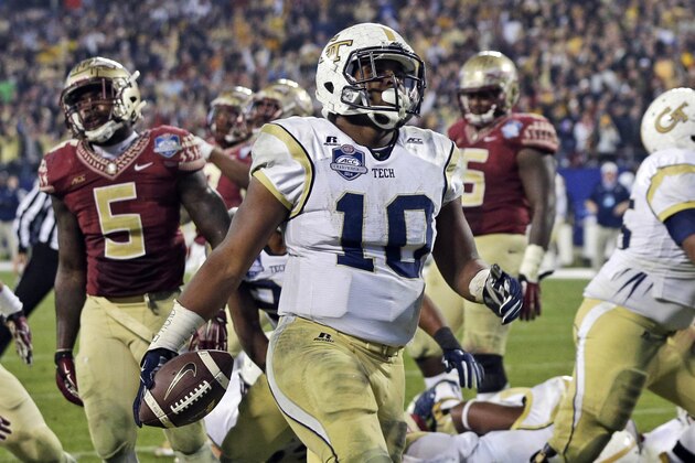Georgia Tech running back Synjyn Days (10) runs into the end zone for a touchdown against Florida State during the second half of the Atlantic Coast Conference championship NCAA college football game in Charlotte, N.C., Saturday, Dec. 6, 2014. (AP Photo/Chuck Burton)