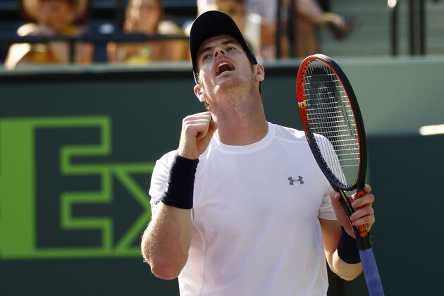 Andy Murray celebrates defeating Kevin Anderson, of South Africa, during their match at the Miami Open tennis tournament in Key Biscayne, Fla., Tuesday, March 31, 2015. Murray won 6-4, 3-6, 6-3. (AP Photo/J Pat Carter)